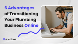 Plumber wearing overalls browsing the internet on a laptop